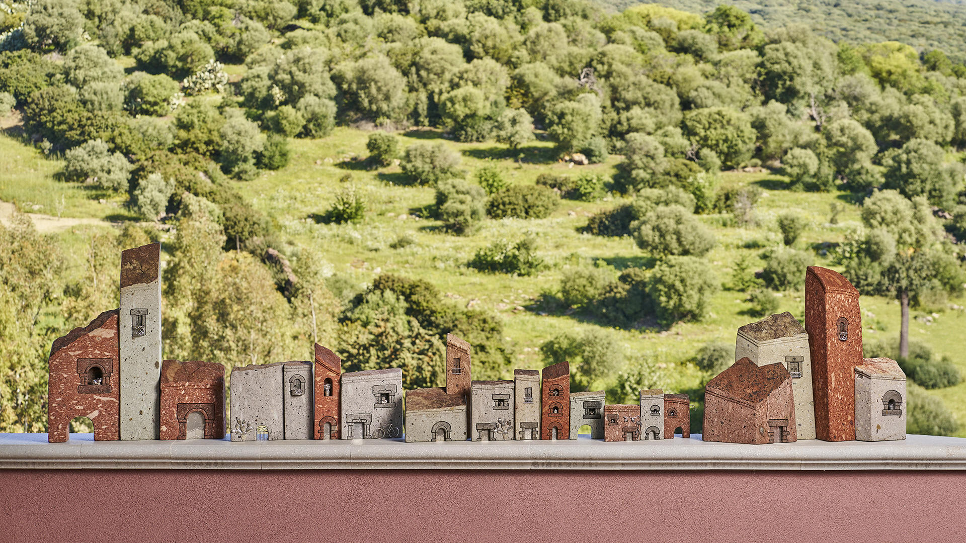 Atiartisticu creazione artigianale di casette in trachite sarda